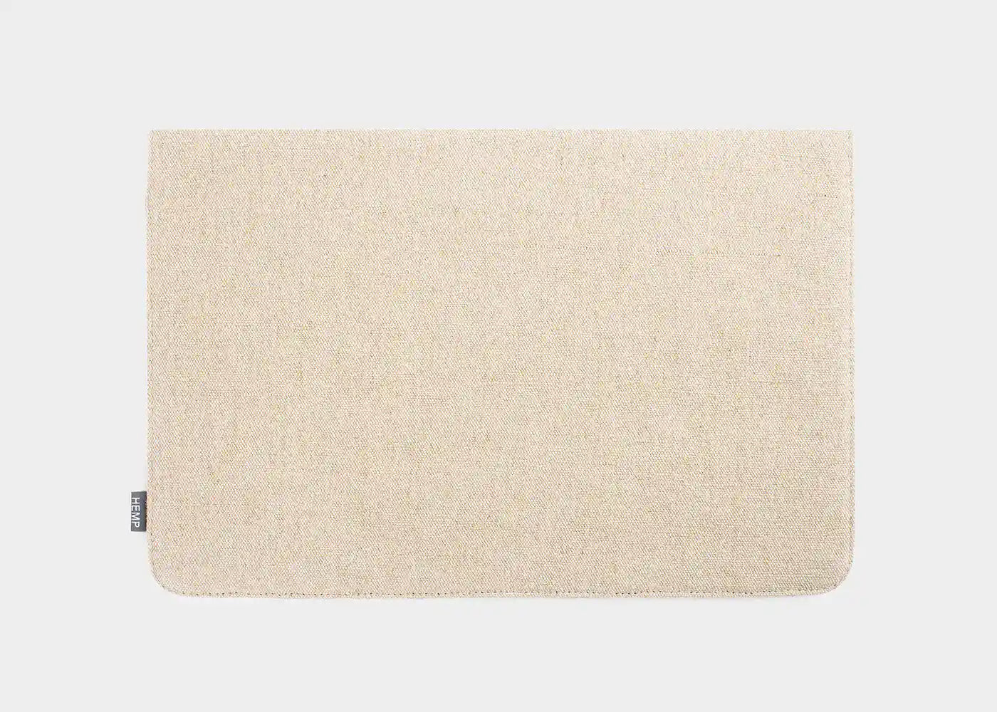 Backside of a beige hemp laptop case.